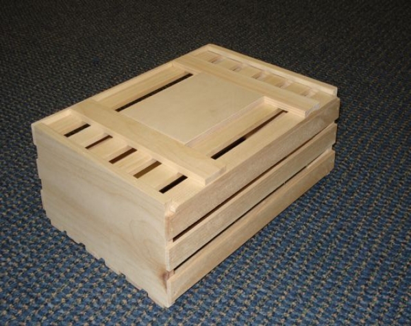 Custom slatted wood crates with a slat slide top. This one is shown unfinished.